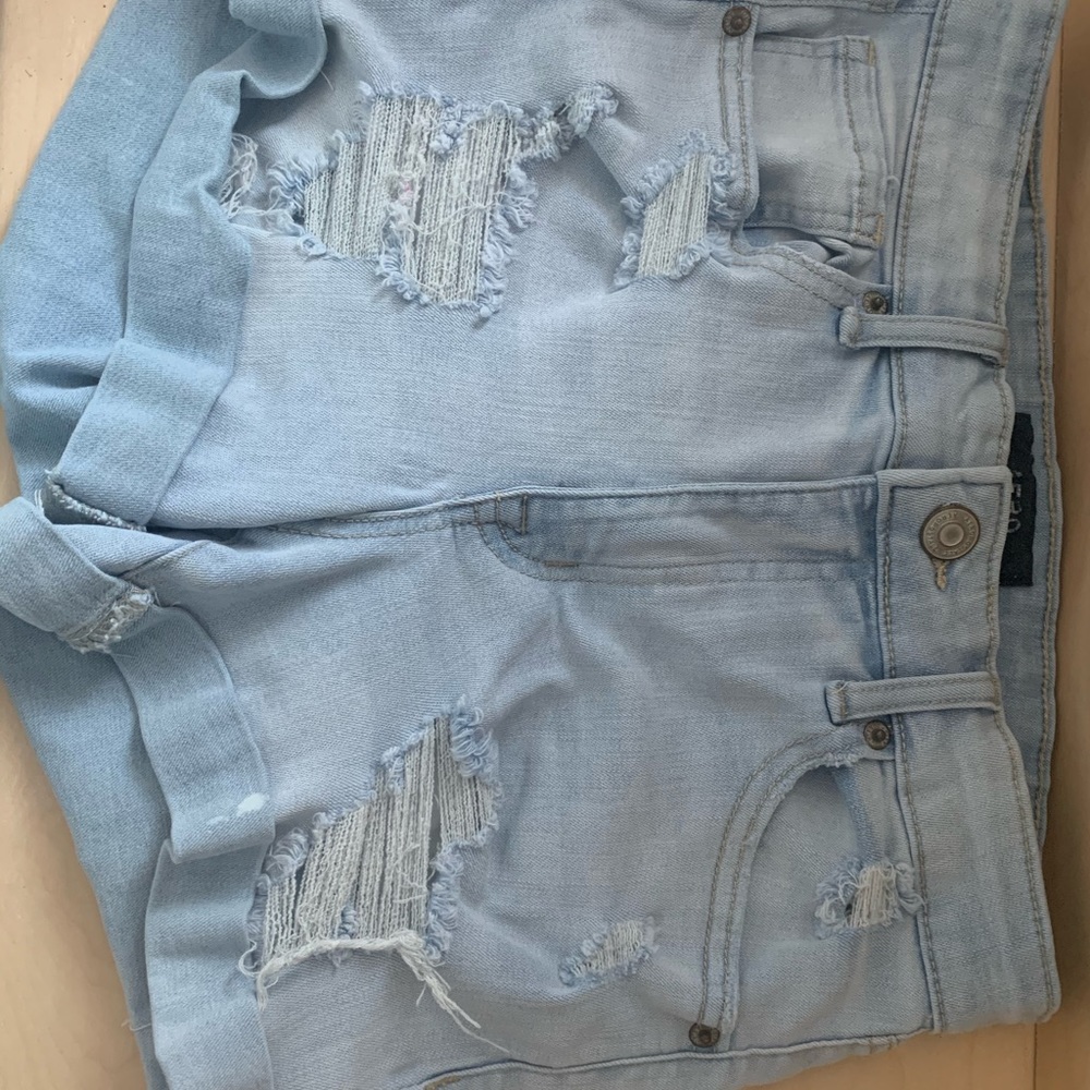 Jean distressed high rises light washed shorts